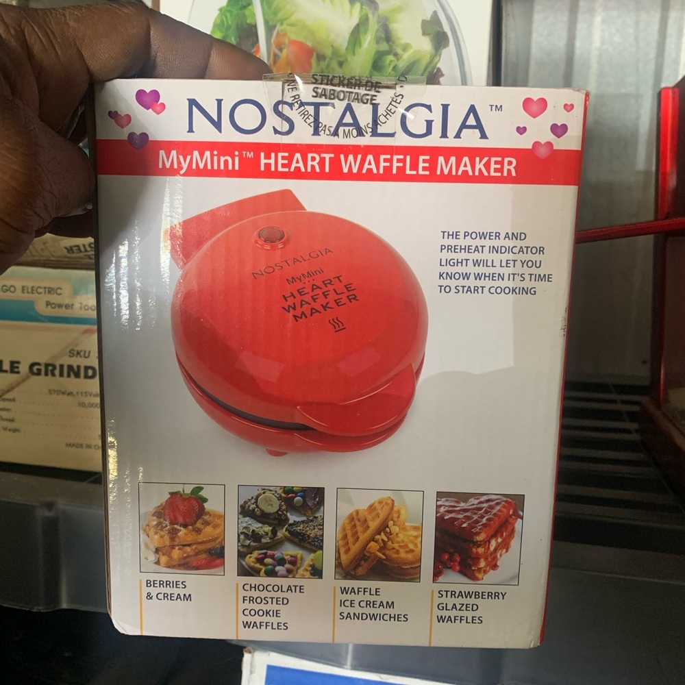 Nostalgia MyMini Heart Waffle Maker in red.